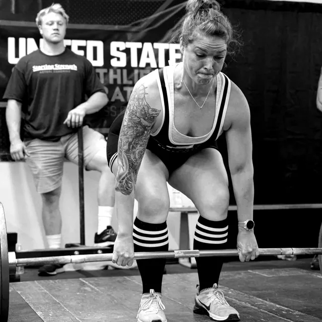 Anna Marie deadlifting at a powerlifting meet